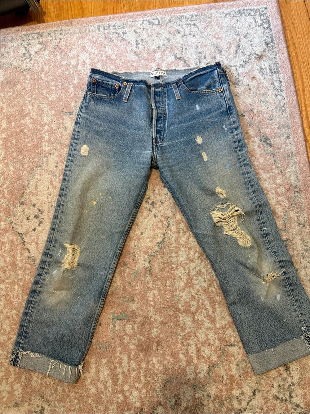 Levi's Distressed Blue Cropped Jeans with Paint Accents